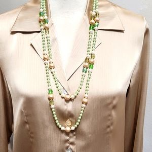 Like new green and tan colored faux pearls